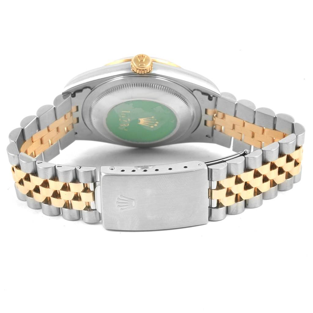 The image shows the back of a Rolex Datejust 16233 Men's Steel and Gold (two tone) Blue Dial 16233 Men's Steel and Gold (two tone) Blue Dial watch, focusing on the bracelet, clasp, and case back.