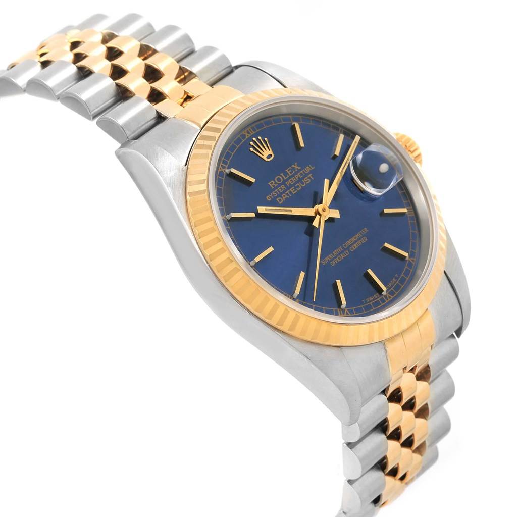 This image shows the face, bezel, and bracelet of a Rolex Datejust 16233 Men's Steel and Gold (two tone) Blue Dial 16233 Men's Steel and Gold (two tone) Blue Dial watch from a three-quarter angle.
