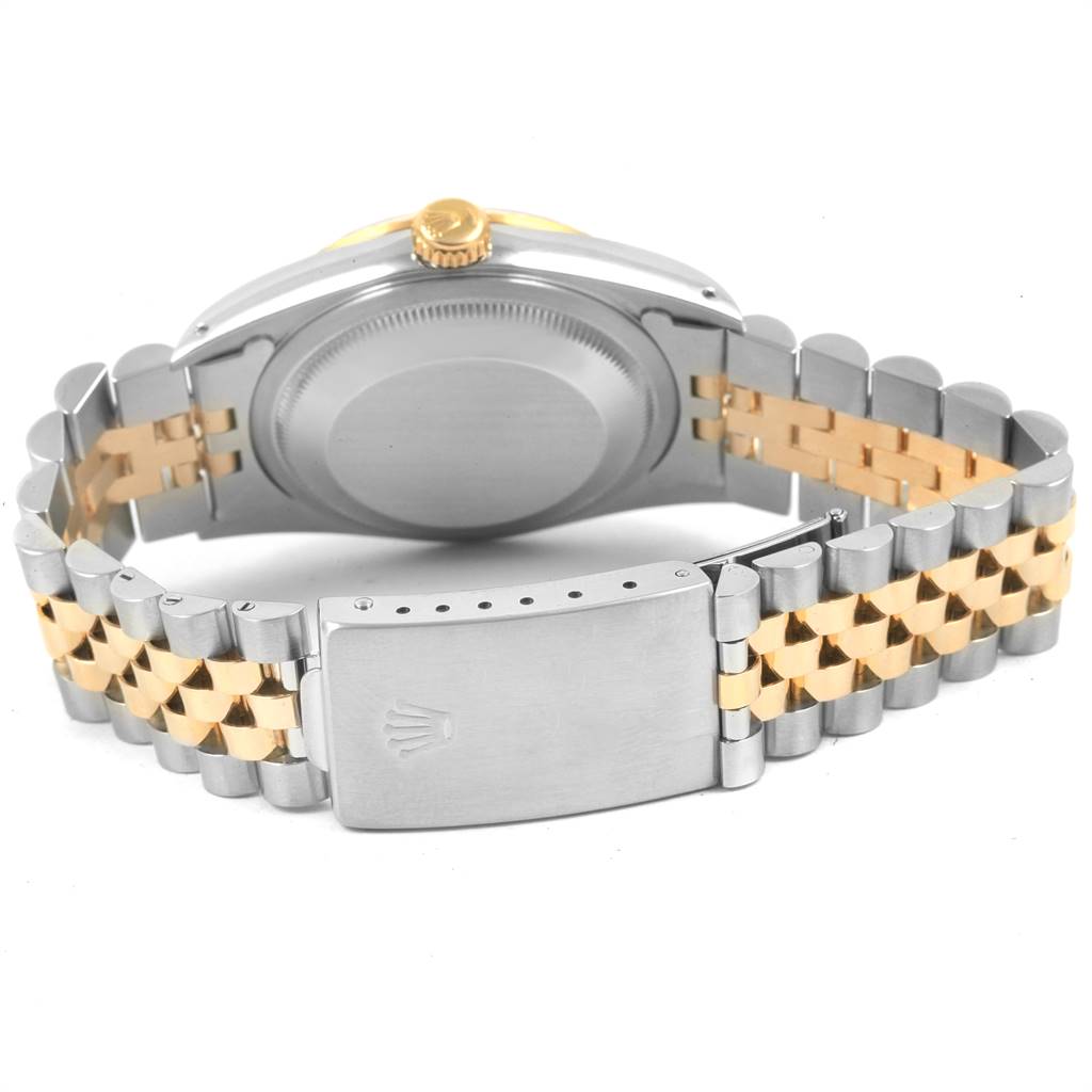 The image shows the back case and bracelet clasp of a Rolex Datejust 16233 Men's Steel and Gold (two tone) Black Dial 16233 Men's Steel and Gold (two tone) Black Dial watch, featuring a two-tone metal design.