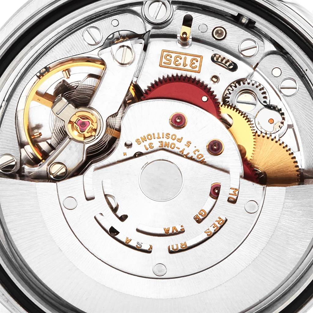 This image shows the intricate internal mechanism and movement components of a Rolex Datejust 16234 Men's Stainless Steel Silver Dial 16234 Men's Stainless Steel Silver Dial watch from a close-up angle.