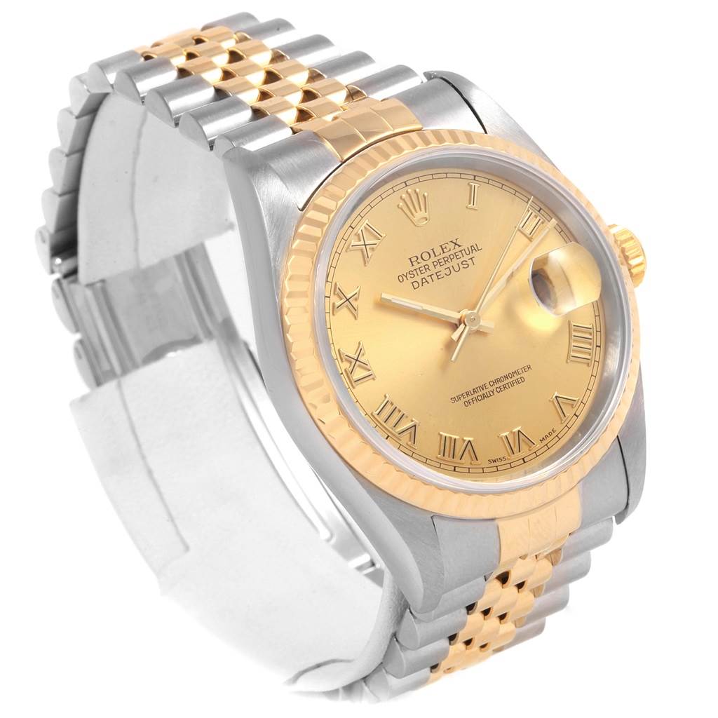 This Rolex Datejust 16233 Men's Steel and Gold (two tone) Champagne Dial 16233 Men's Steel and Gold (two tone) Champagne Dial watch is shown at a slight angle displaying its gold dial, two-tone bracelet, and fluted bezel.
