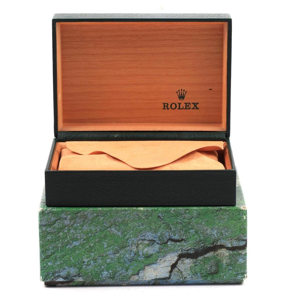 The image shows an open Rolex Datejust 16233 Men's Steel and Gold (two tone) White Dial 16233 Men's Steel and Gold (two tone) White Dial watch box with an orange cloth inside, viewed from the front.