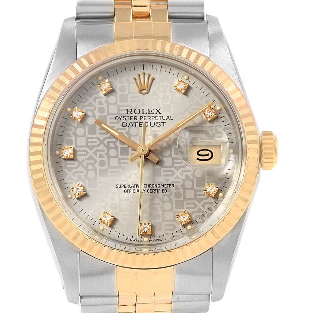The image shows a front close-up of the Rolex Datejust 16013 Men's Stainless Steel Silver Dial 16013 Men's Stainless Steel Silver Dial watch featuring a two-tone bracelet and diamond hour markers.