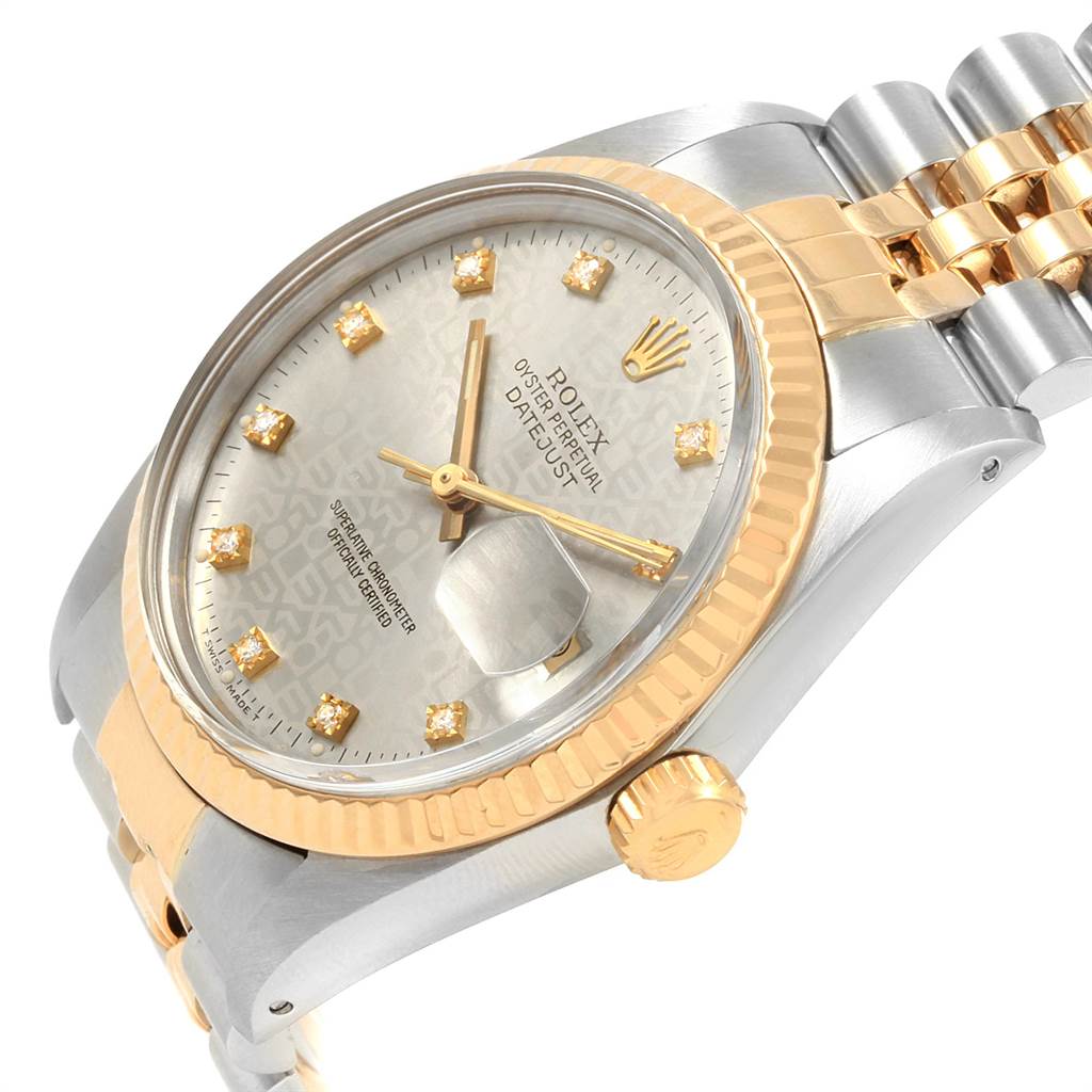 This image shows a Rolex Datejust 16013 Men's Stainless Steel Silver Dial 16013 Men's Stainless Steel Silver Dial watch angled to highlight the dial, crown, bezel, and part of the bracelet.