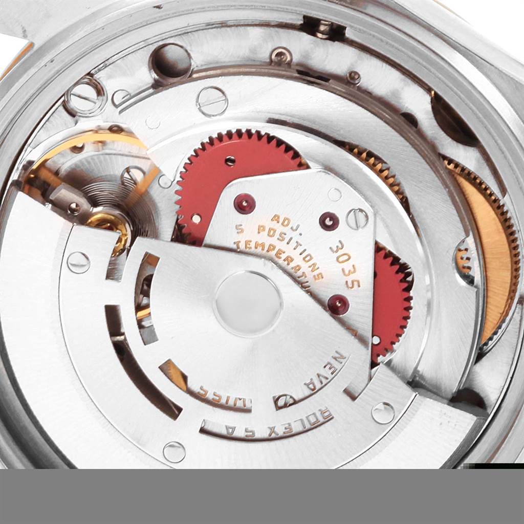 This image shows the internal movement of the Rolex Datejust 16013 Men's Stainless Steel Silver Dial 16013 Men's Stainless Steel Silver Dial watch, highlighting gears and mechanisms.