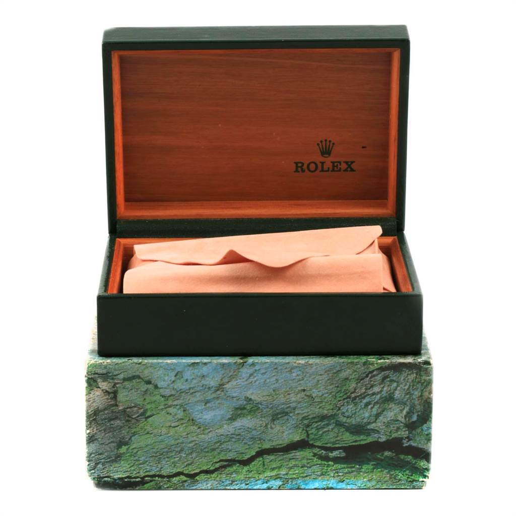 The image shows an open box and protective covering for a Rolex Datejust 16013 Men's Stainless Steel Champagne Dial 16013 Men's Stainless Steel Champagne Dial watch from a front angle.