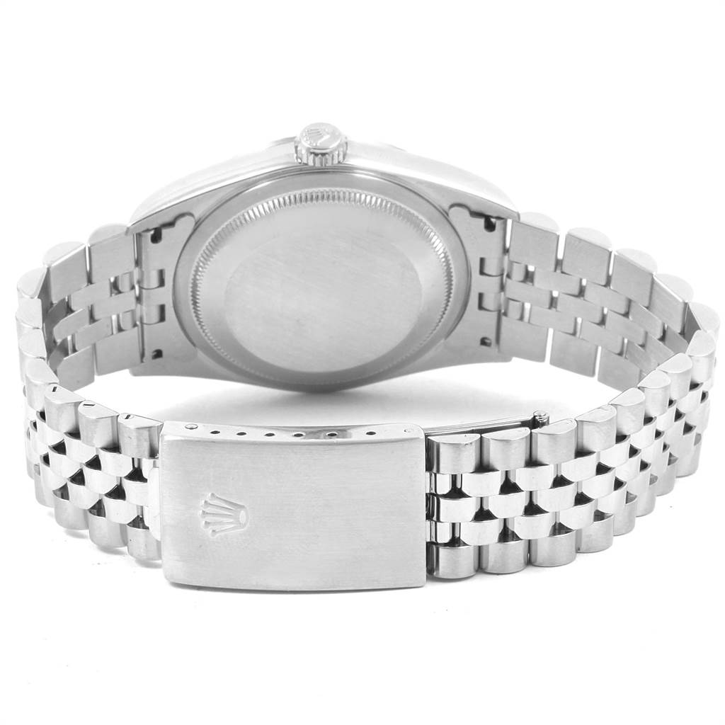 The image shows the back view of a Rolex Datejust 16234 Men's Stainless Steel Silver Dial 16234 Men's Stainless Steel Silver Dial watch, featuring its case back, crown, and Jubilee bracelet with clasp.