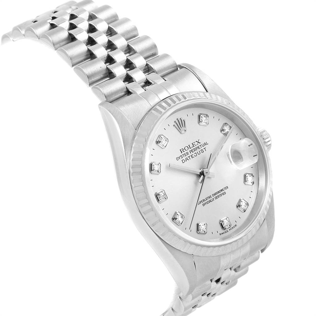 This image shows a Rolex Datejust 16234 Men's Stainless Steel Silver Dial 16234 Men's Stainless Steel Silver Dial watch at an angle focusing on the face, bezel, and part of the bracelet.