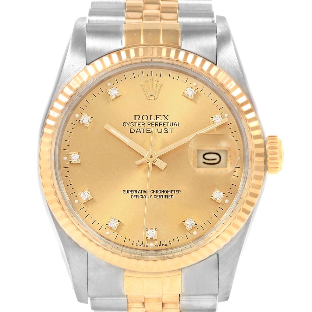 The image shows a close-up of the face, bezel, and crown of a Rolex Datejust 16013 Men's Stainless Steel Champagne Dial 16013 Men's Stainless Steel Champagne Dial watch.