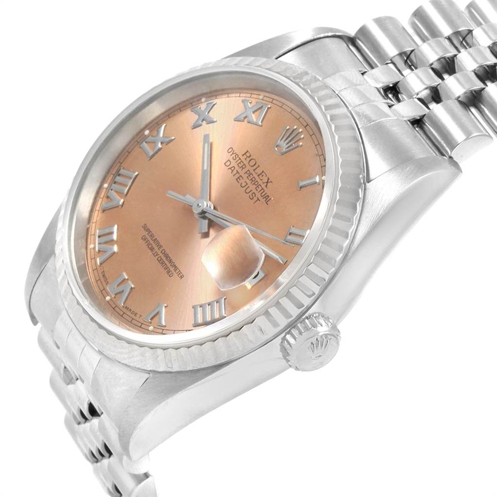 The image shows a close-up angle of the Rolex Datejust 16234 Men's Stainless Steel Pink Dial 16234 Men's Stainless Steel Pink Dial watch, highlighting the dial, bezel, crown, and bracelet.