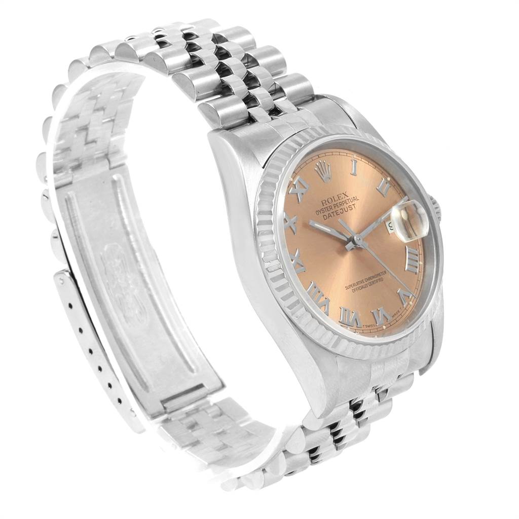 The image shows a Rolex Datejust 16234 Men's Stainless Steel Pink Dial 16234 Men's Stainless Steel Pink Dial watch from a side angle, highlighting its face, bezel, and part of the bracelet.