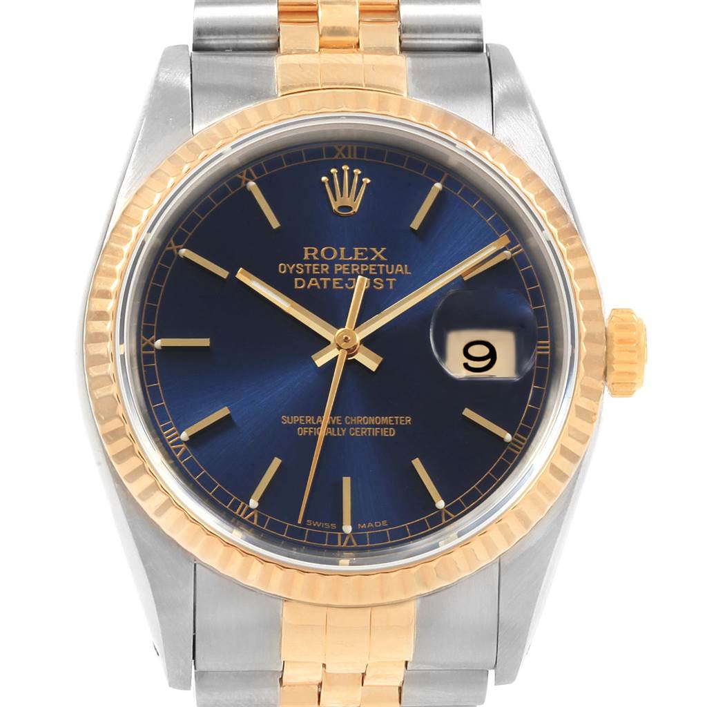 The image shows a frontal view of a Rolex Datejust 16233 Men's Steel and Gold (two tone) Blue Dial 16233 Men's Steel and Gold (two tone) Blue Dial watch, highlighting its gold and silver bracelet, blue dial, and date window.