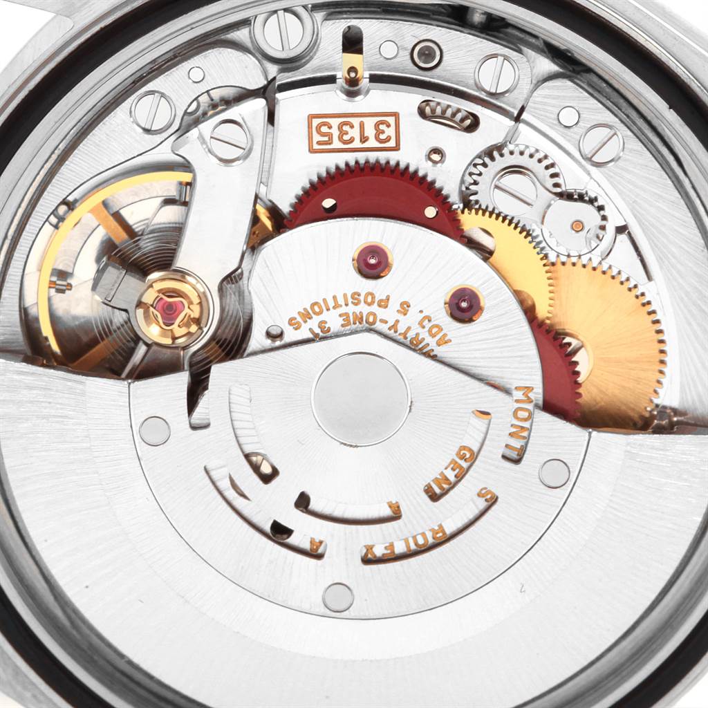 The image shows the internal mechanism and movement of a Rolex Datejust 16233 Men's Steel and Gold (two tone) Blue Dial 16233 Men's Steel and Gold (two tone) Blue Dial watch from a top-down angle.