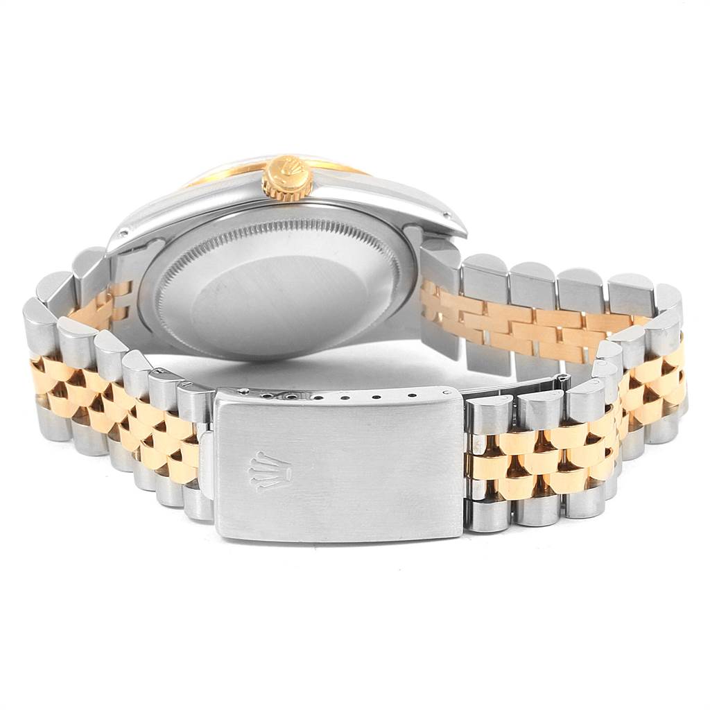 The image shows the back view and clasp of a Rolex Datejust 16233 Men's Steel and Gold (two tone) Blue Dial 16233 Men's Steel and Gold (two tone) Blue Dial watch, highlighting its jubilee bracelet and two-tone metal band.