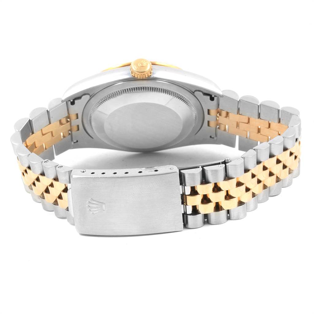 The image shows the back case and clasp of a Rolex Datejust 16233 Men's Steel and Gold (two tone) Blue Dial 16233 Men's Steel and Gold (two tone) Blue Dial watch, highlighting its two-tone bracelet.