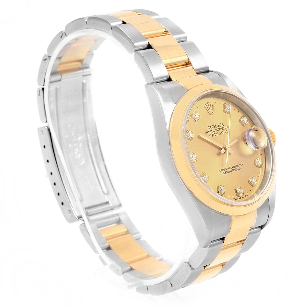 This image shows a side view of the Rolex Datejust 16203 Men's Steel and Gold (two tone) Champagne Dial 16203 Men's Steel and Gold (two tone) Champagne Dial watch, highlighting its gold dial, diamond markers, and two-tone bracelet.