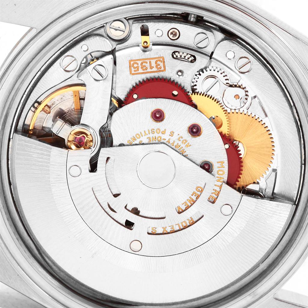 This image shows the internal mechanical movement of the Rolex Datejust 16233 Men's Steel and Gold (two tone) Black Dial 16233 Men's Steel and Gold (two tone) Black Dial watch from a back view angle.