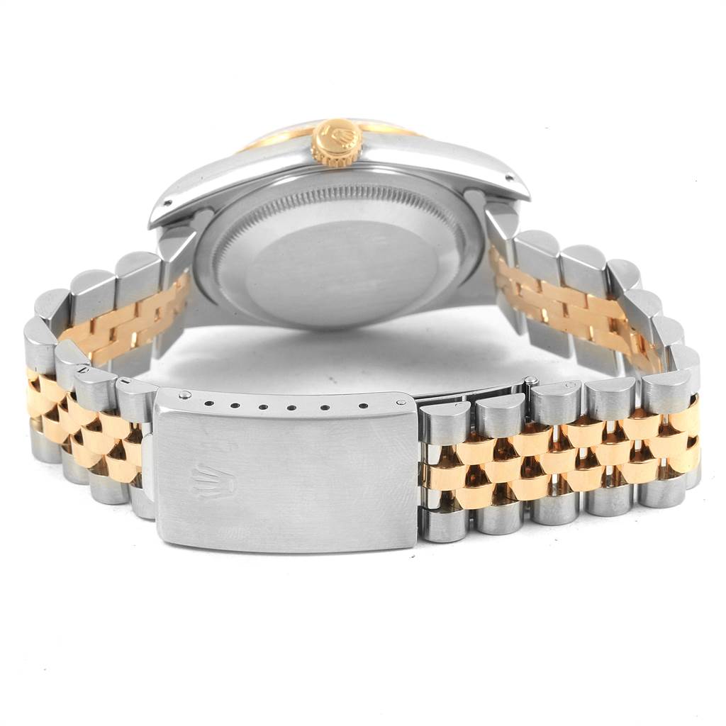 This image shows the back of a Rolex Datejust 16233 Men's Steel and Gold (two tone) Black Dial 16233 Men's Steel and Gold (two tone) Black Dial watch, including the case back, crown, and Jubilee bracelet clasp in a two-tone design.