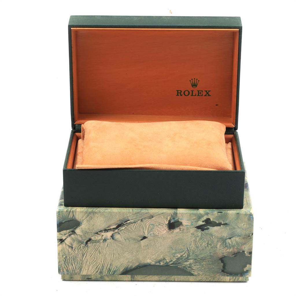 The image shows an open retail box of a Rolex Datejust 16233 Men's Steel and Gold (two tone) Black Dial 16233 Men's Steel and Gold (two tone) Black Dial watch, displaying the inside packaging and the logo.