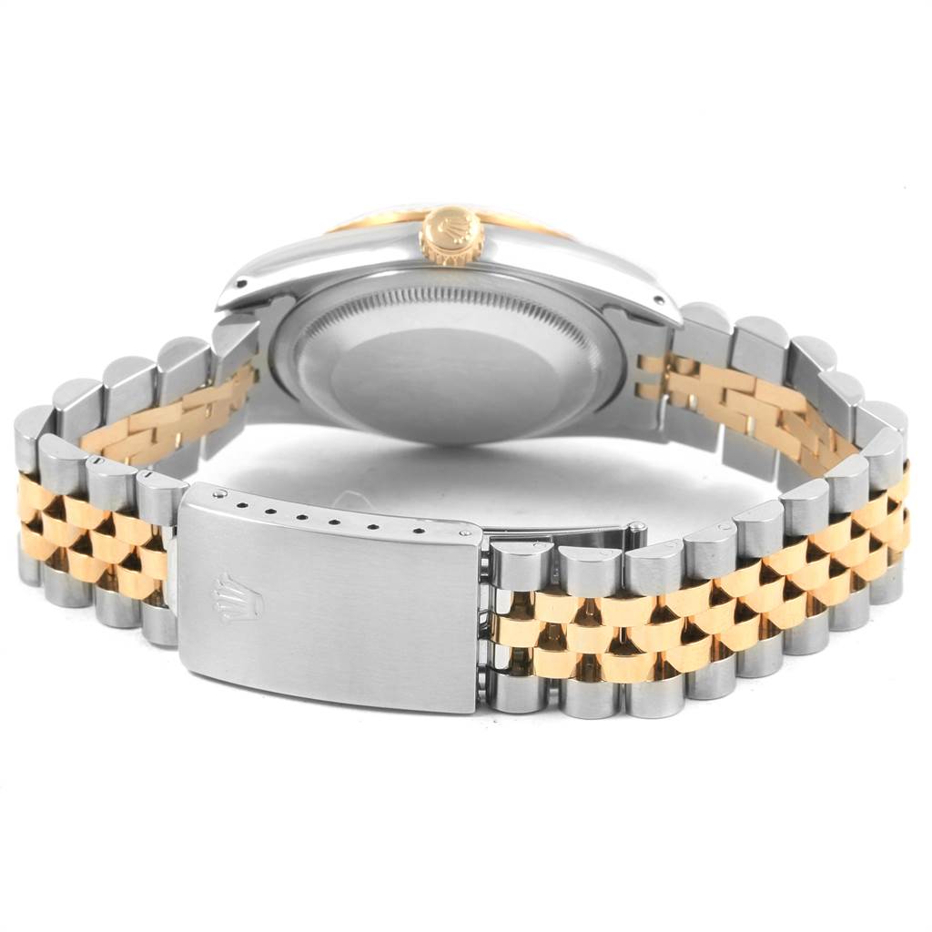 The image shows the back view of a Rolex Datejust 16233 Men's Steel and Gold (two tone) Black Dial 16233 Men's Steel and Gold (two tone) Black Dial watch, highlighting the case back and two-tone bracelet clasp.