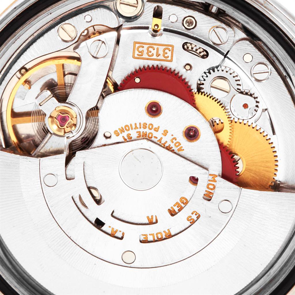 This image shows a close-up view of the movement and internal mechanisms of a Rolex Datejust 16233 Men's Steel and Gold (two tone) Black Dial 16233 Men's Steel and Gold (two tone) Black Dial model watch.