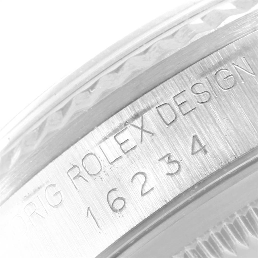The image shows a close-up of the case side, displaying the model number and "Rolex Design" engraving on a Rolex Datejust 16234 Men
s Stainless Steel White Dial 16234 Men
s Stainless Steel White Dial watch.