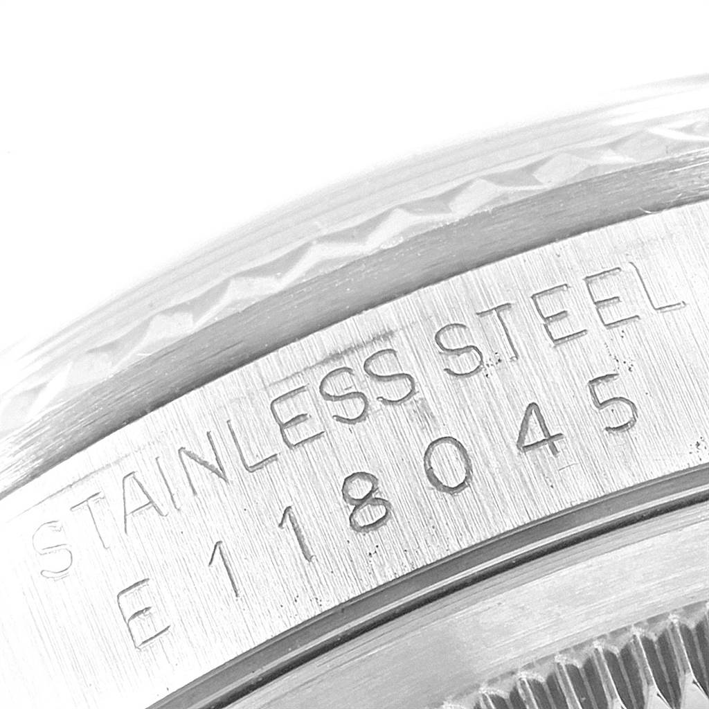 This image shows a close-up of the serial number and stainless steel engraving on the casing of a Rolex Datejust 16234 Men
s Stainless Steel White Dial 16234 Men
s Stainless Steel White Dial watch.