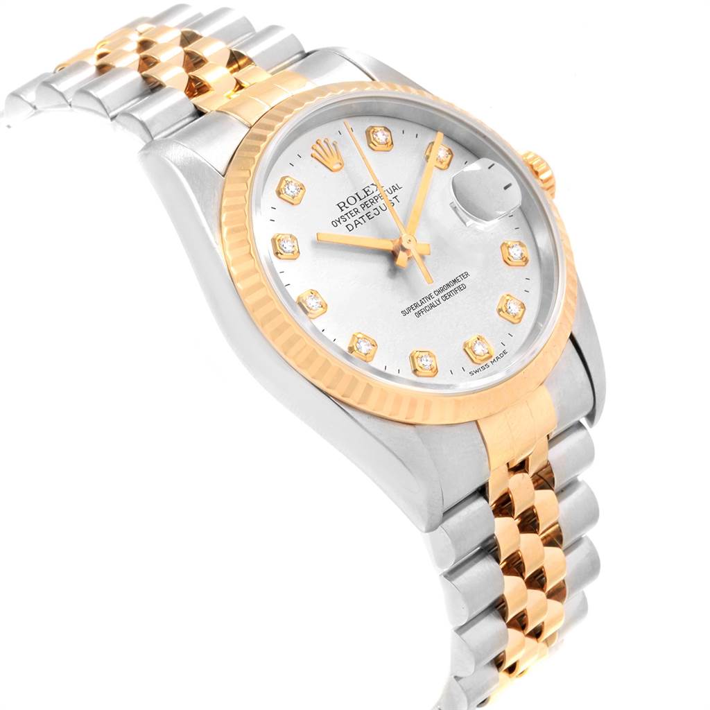 This image shows a Rolex Datejust 16233 Men's Steel and Gold (two tone) Silver Dial 16233 Men's Steel and Gold (two tone) Silver Dial watch from a slight angled top view, highlighting its bezel, face, and two-tone Jubilee bracelet.