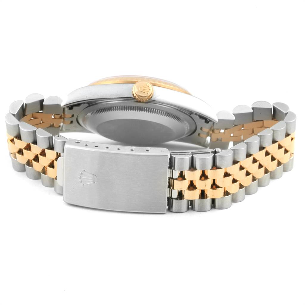 The image shows the back and side view of the Rolex Datejust 16233 Men's Steel and Gold (two tone) Silver Dial 16233 Men's Steel and Gold (two tone) Silver Dial watch, focusing on the clasp and bracelet.