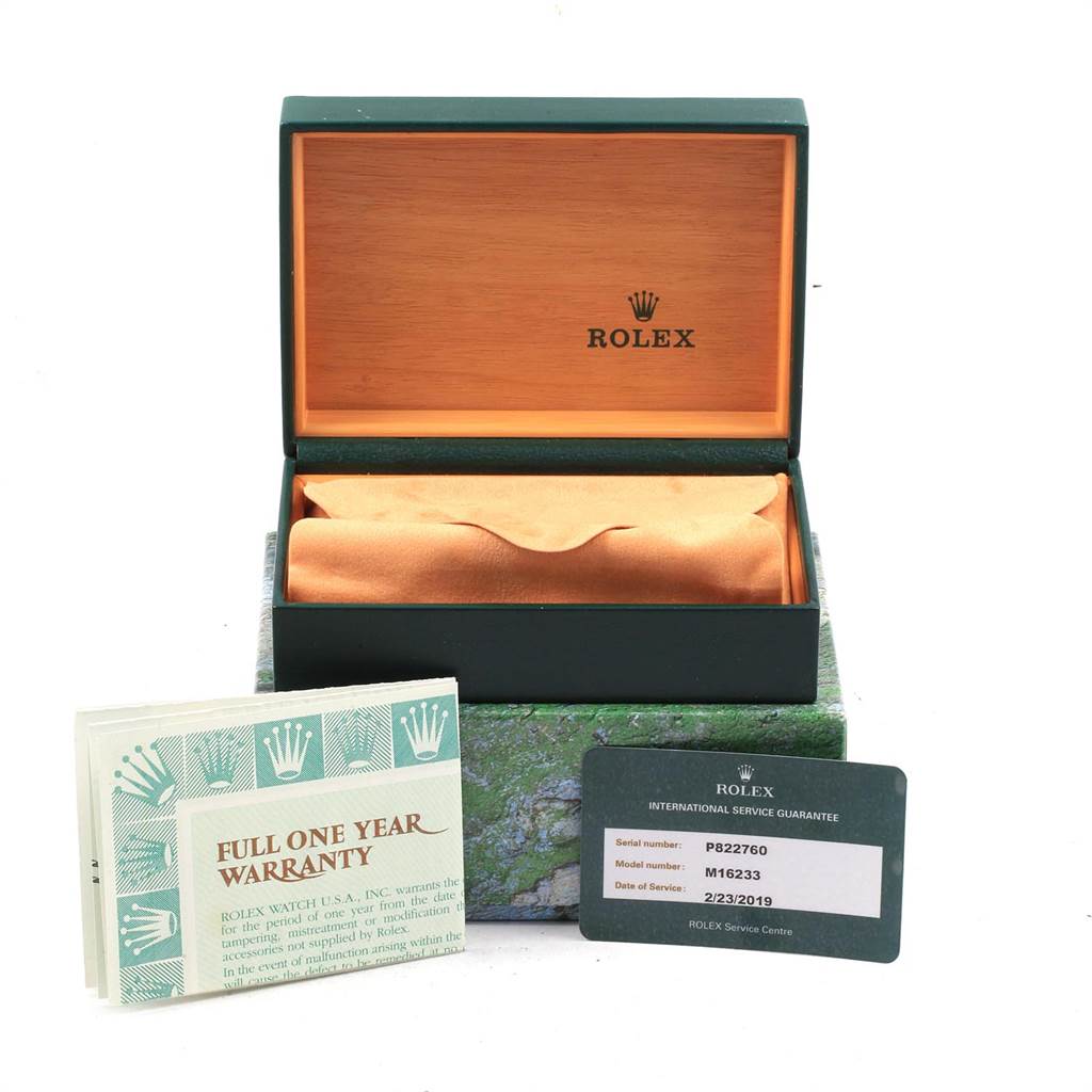 The image shows a Rolex Datejust 16233 Men's Steel and Gold (two tone) Silver Dial 16233 Men's Steel and Gold (two tone) Silver Dial watch box, a full one-year warranty booklet, and an international service guarantee card.