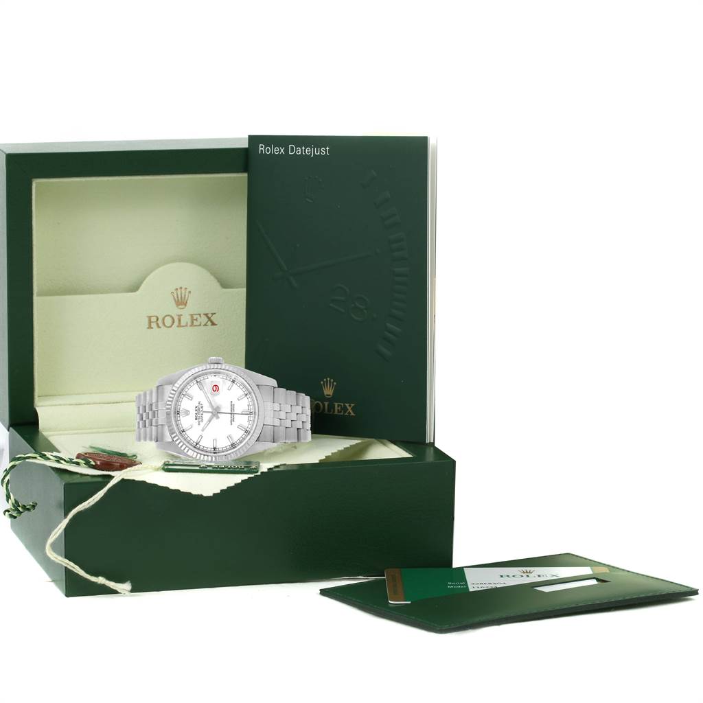 The image shows a Rolex Datejust 116234 Men's Stainless Steel White Dial 116234 Men's Stainless Steel White Dial watch, its box, and accessories from a front angle.