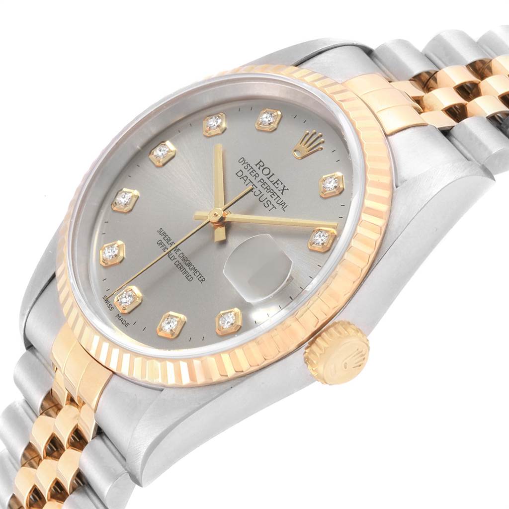 This image shows a Rolex Datejust 16233 Men
s Steel and Gold (two tone) Silver Dial 16233 Men
s Steel and Gold (two tone) Silver Dial watch angled to display its face, bezel, crown, and part of the band.