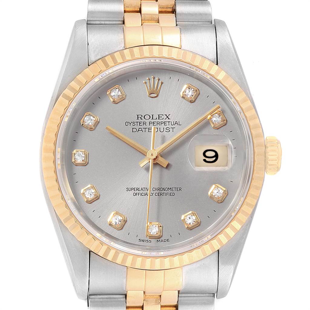 The Rolex Datejust 16233 Men
s Steel and Gold (two tone) Silver Dial 16233 Men
s Steel and Gold (two tone) Silver Dial watch is shown from a front angle, displaying its dial, bezel, hands, date window, and part of the bracelet.