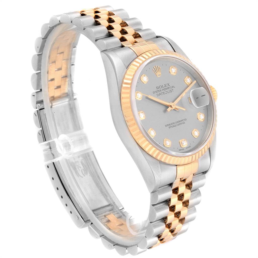 This image shows a side angle of a Rolex Datejust 16233 Men
s Steel and Gold (two tone) Silver Dial 16233 Men
s Steel and Gold (two tone) Silver Dial watch, highlighting the jubilee bracelet and fluted bezel.