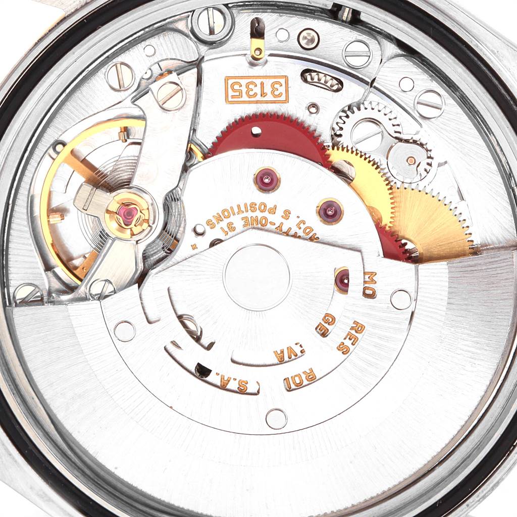 This image shows the intricate inner mechanism of a Rolex Datejust 16233 Men
s Steel and Gold (two tone) Silver Dial 16233 Men
s Steel and Gold (two tone) Silver Dial watch from a back angle.
