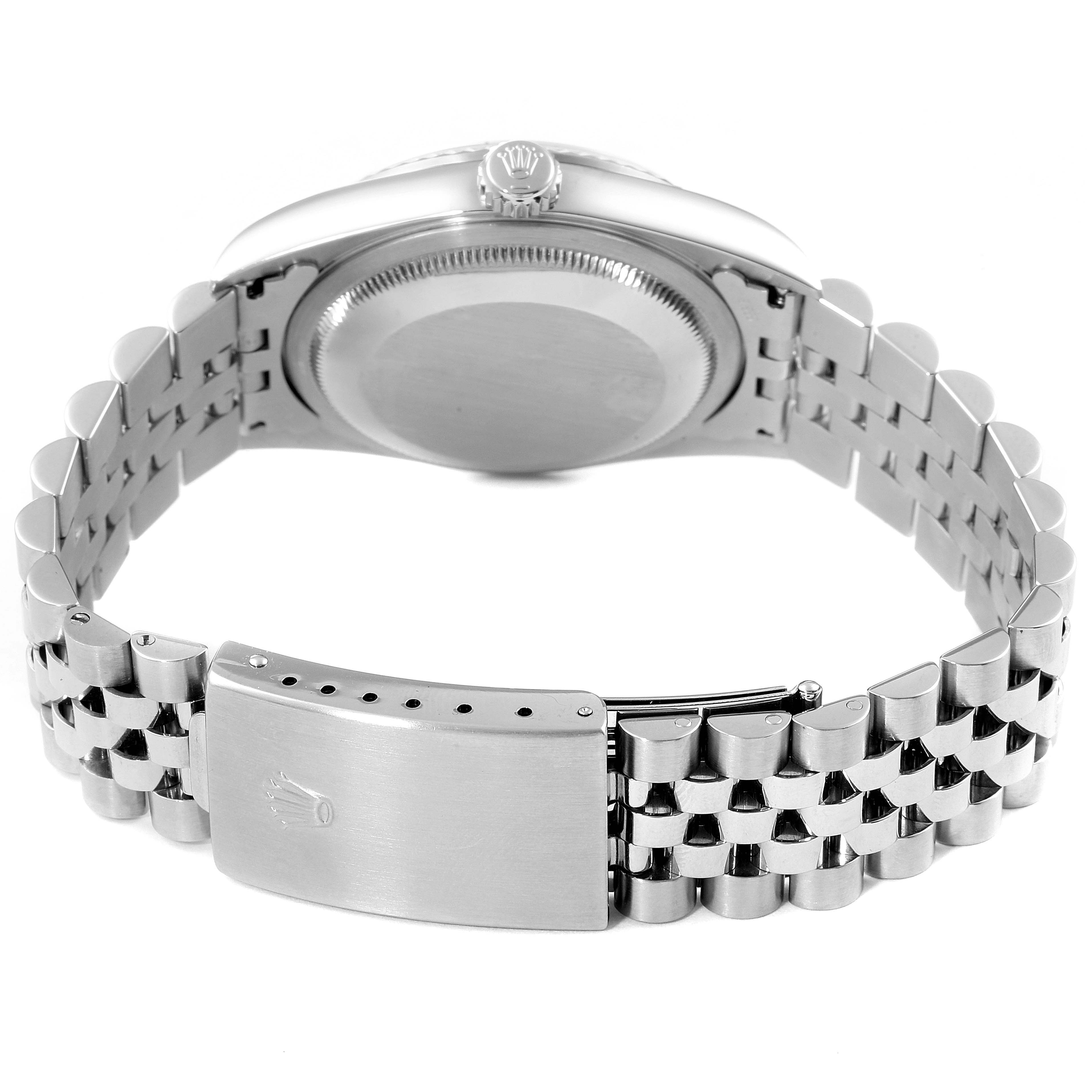 The image shows the back view of a Rolex Datejust 16234 Men's Stainless Steel Mother of Pearl Dial 16234 Men's Stainless Steel Mother of Pearl Dial watch, highlighting the case back and the clasp of the bracelet.