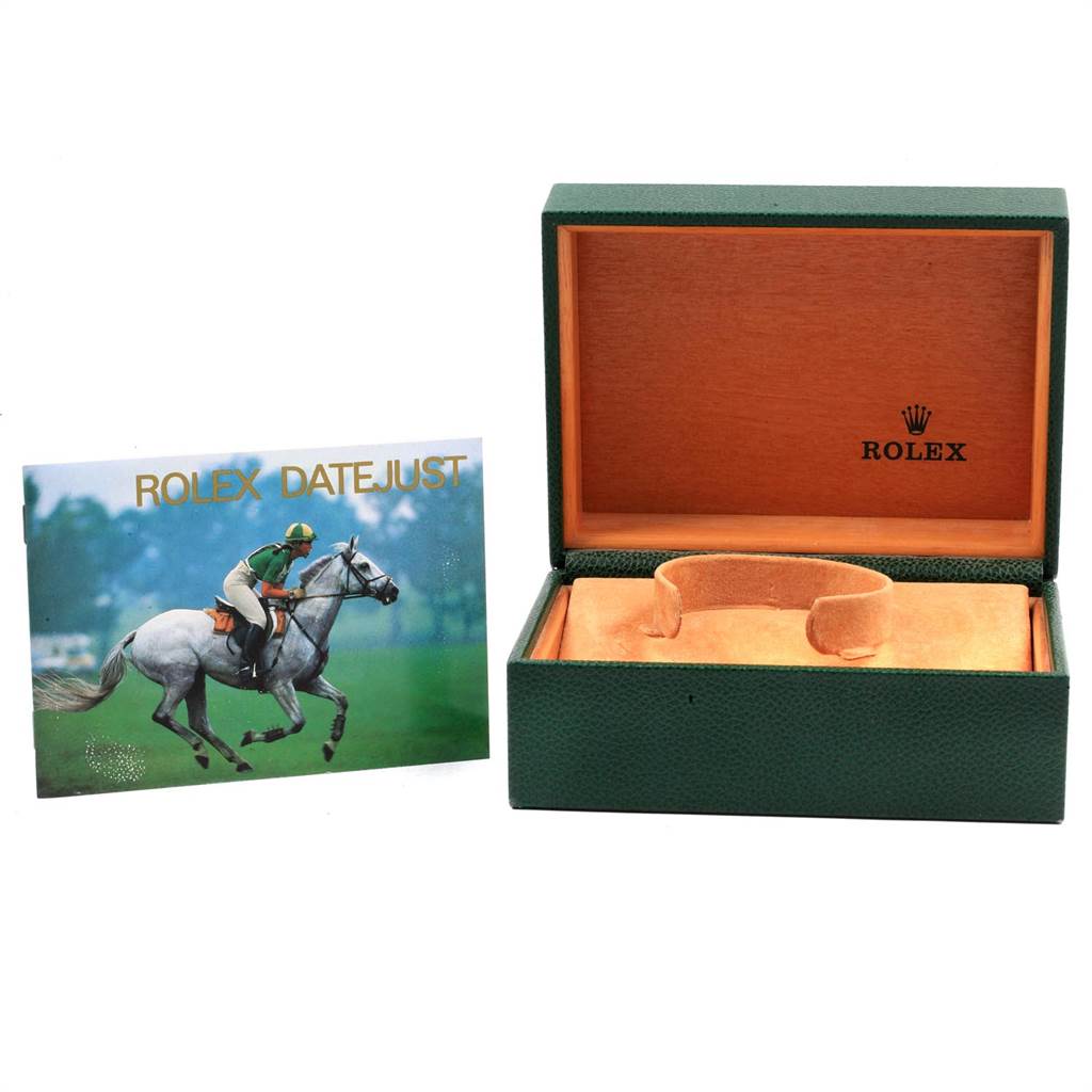 The image shows an open Rolex Datejust 16200 Men's Stainless Steel White Dial 16200 Men's Stainless Steel White Dial box and a Rolex Datejust 16200 Men's Stainless Steel White Dial 16200 Men's Stainless Steel White Dial booklet angled from the front.