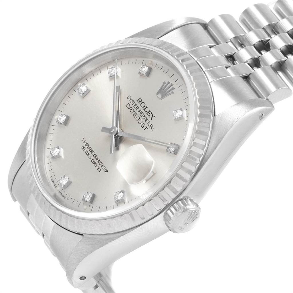 This image shows a close-up side angle of a Rolex Datejust 16234 Men
s Stainless Steel Silver Dial 16234 Men
s Stainless Steel Silver Dial watch, highlighting its face, bezel, crown, and part of the bracelet.