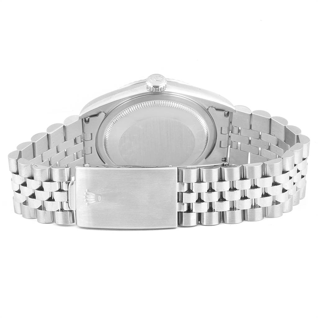 The image shows the back view of a Rolex Datejust 16234 Men
s Stainless Steel Silver Dial 16234 Men
s Stainless Steel Silver Dial watch, highlighting its bracelet and clasp.