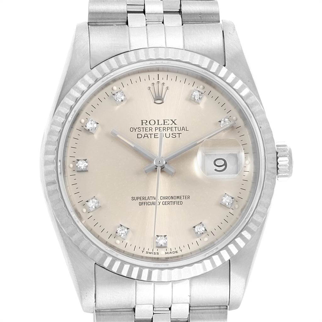 The image shows a front view of a Rolex Datejust 16234 Men's Stainless Steel Silver Dial 16234 Men's Stainless Steel Silver Dial watch, featuring a fluted bezel, champagne dial, and Jubilee bracelet.