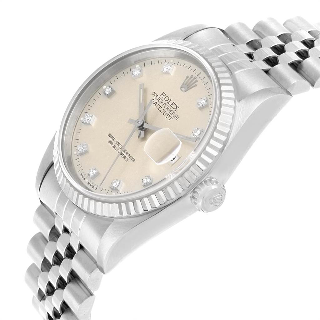 This image shows a side and top angle of a Rolex Datejust 16234 Men's Stainless Steel Silver Dial 16234 Men's Stainless Steel Silver Dial watch, highlighting the dial, bezel, crown, and bracelet.