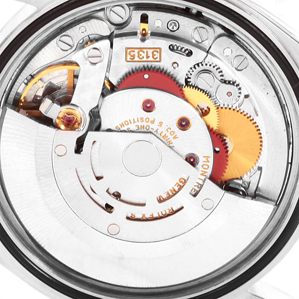 The image shows the intricate internal mechanical parts of a Rolex Datejust 16234 Men's Stainless Steel Silver Dial 16234 Men's Stainless Steel Silver Dial watch from a rear angle.