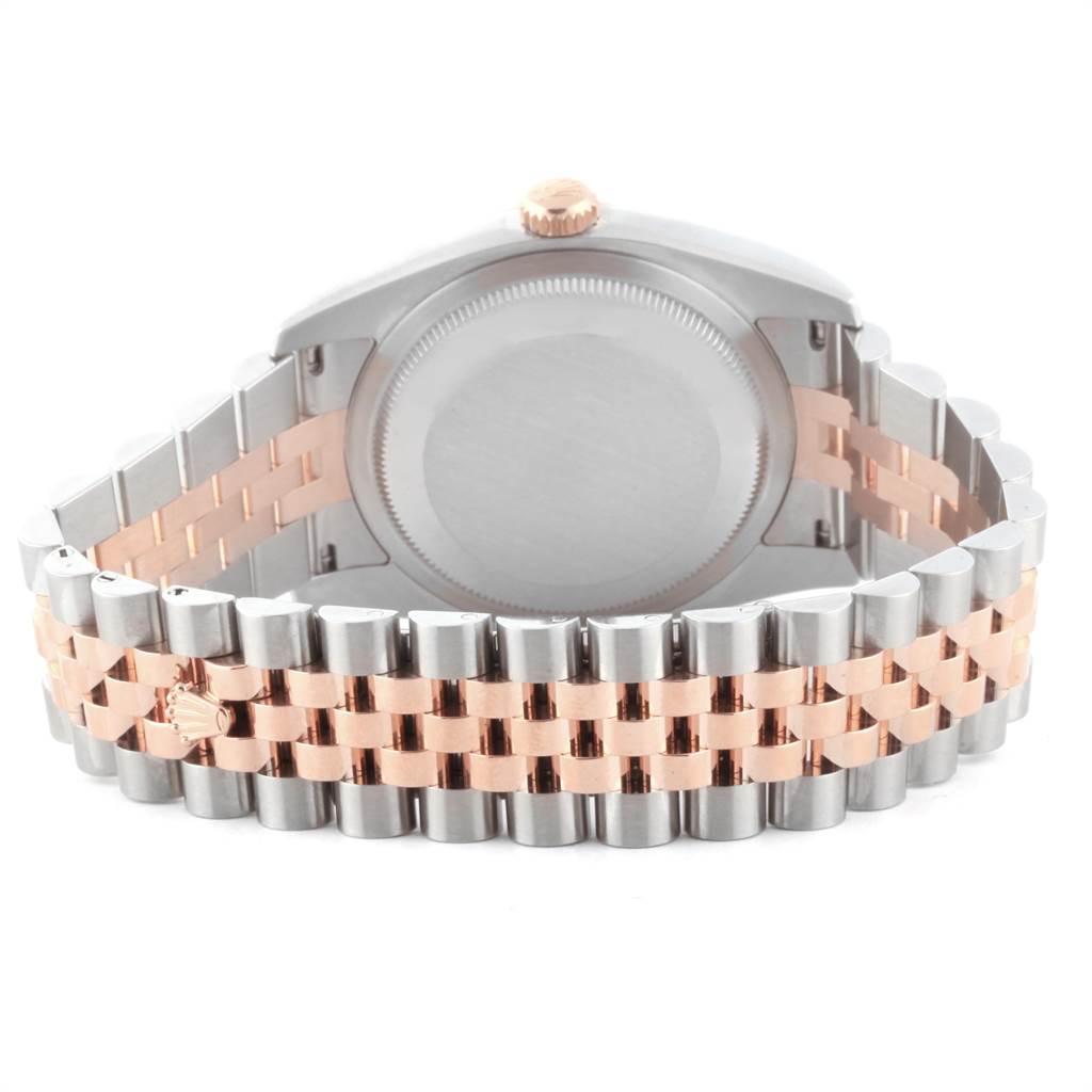 The image shows the back of a Rolex Datejust 116231 Men's Steel and Gold (two tone) Pink Dial 116231 Men's Steel and Gold (two tone) Pink Dial watch and its two-tone Jubilee bracelet.