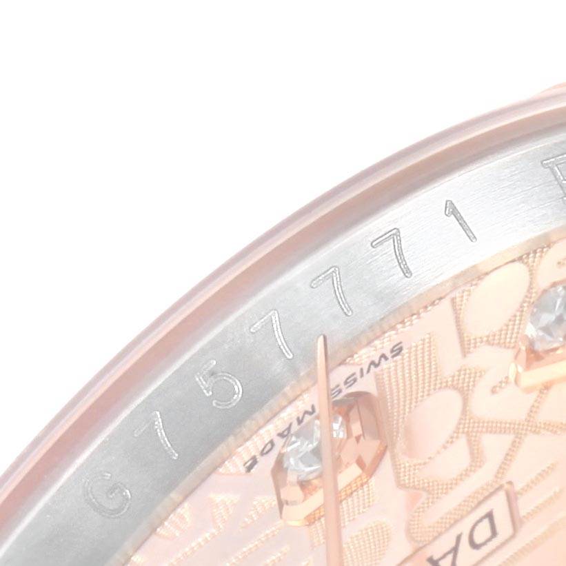 The image shows a close-up of the date dial, a portion of the bezel, and hour markers of a Rolex Datejust 116231 Men's Steel and Gold (two tone) Pink Dial 116231 Men's Steel and Gold (two tone) Pink Dial watch.