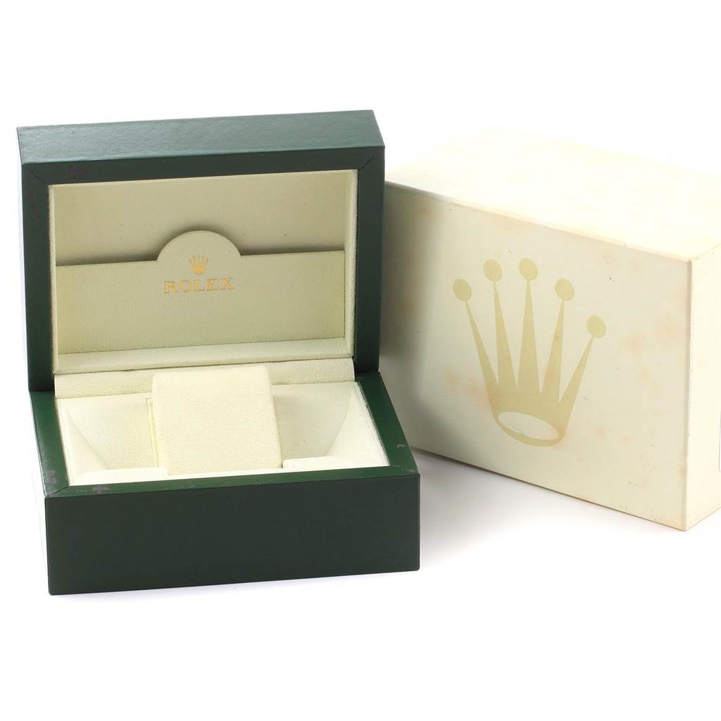 The image shows an open Rolex Datejust 116233 Men
s Stainless Steel Silver Dial 116233 Men
s Stainless Steel Silver Dial watch box and its outer packaging displaying the Rolex crown logo.