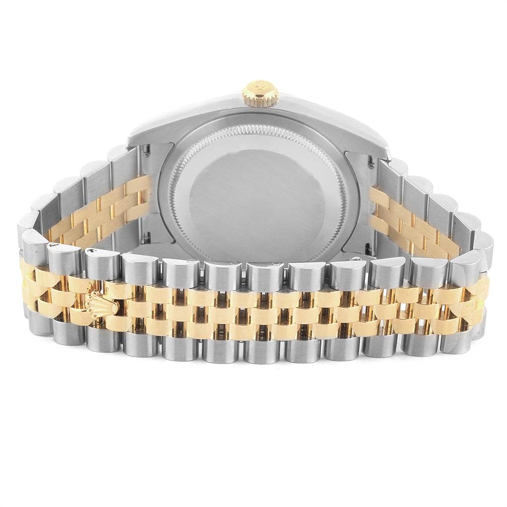 The image shows a rear view of a Rolex Datejust 116233 Men
s Stainless Steel Silver Dial 116233 Men
s Stainless Steel Silver Dial watch, highlighting the case back and its two-tone bracelet.