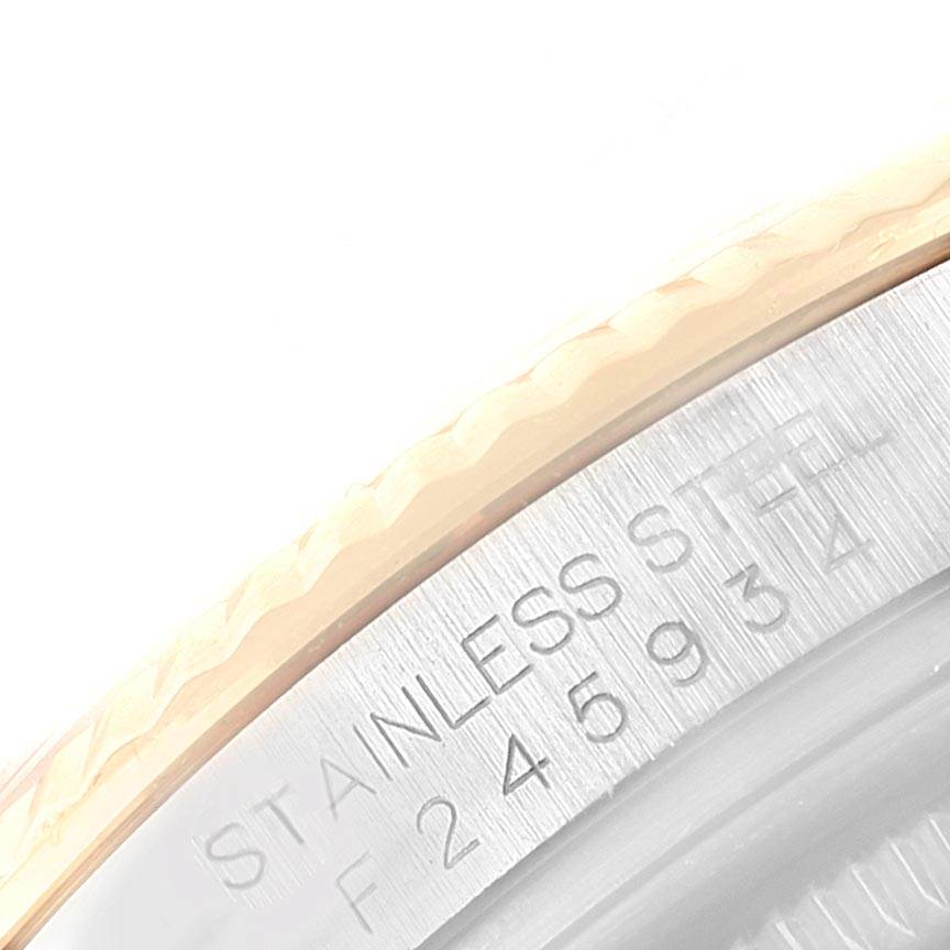 This image shows a close-up of the side of a Rolex Datejust 116233 Men
s Stainless Steel Silver Dial 116233 Men
s Stainless Steel Silver Dial watch, highlighting the stainless steel engraving and its model number.