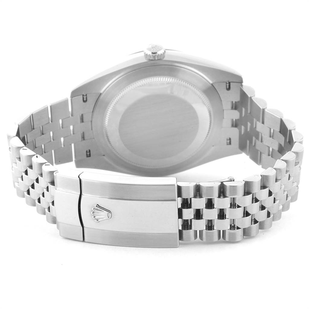 The image shows the back case and Oyster bracelet clasp of a Rolex Datejust 126300 Men
s Stainless Steel Black Dial 126300 Men
s Stainless Steel Black Dial watch from a rear angle.