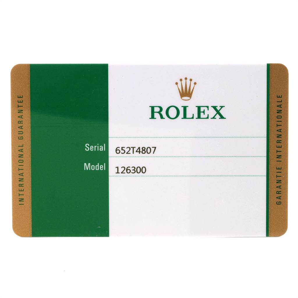 The image shows the warranty card for a Rolex Datejust 126300 Men
s Stainless Steel Black Dial 126300 Men
s Stainless Steel Black Dial model 126300.