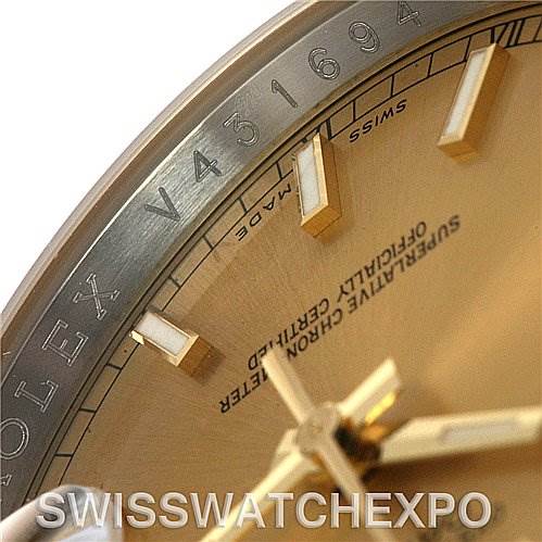 This image shows a close-up of the dial and bezel of a Rolex Datejust 116233-CSJ Men's Stainless Steel Champagne Dial 116233-CSJ Men's Stainless Steel Champagne Dial watch, including part of its serial number.